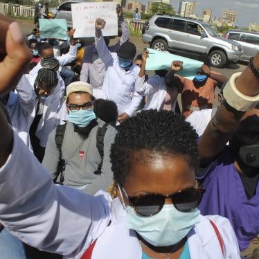 Medical workers protest to honor medical staff who have died from Covid-19, and to demand better protection and working conditions from the government, outside the Ministry of Health in Nairobi, Kenya, December 9, 2020. 