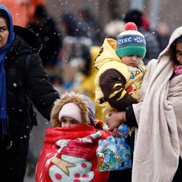 People fleeing the Russian invasion of Ukraine arrive at a temporary camp in Przemysl, Poland, February 28, 2022.