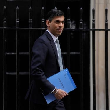 Rishi Sunak, Britain's Chancellor of the Exchequer, poses for the media as he leaves 11 Downing Street
