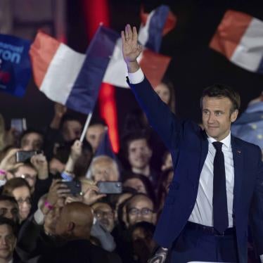 French President Emmanuel Macron delivers a speech after his election victory in Paris, April 24, 2022.