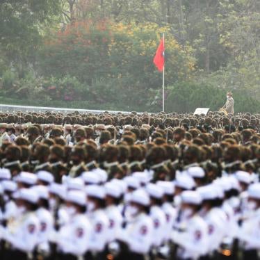 Officers march during a parade