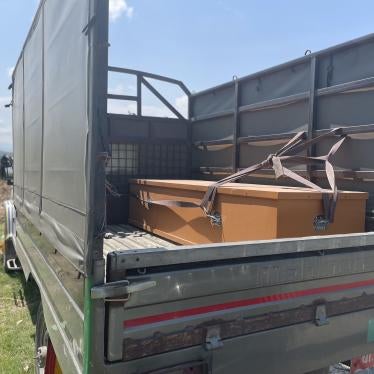 A casket of a deceased Nepali migrant worker being brought to their family.