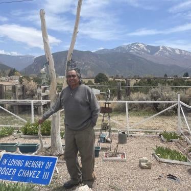 A man stands in a garden