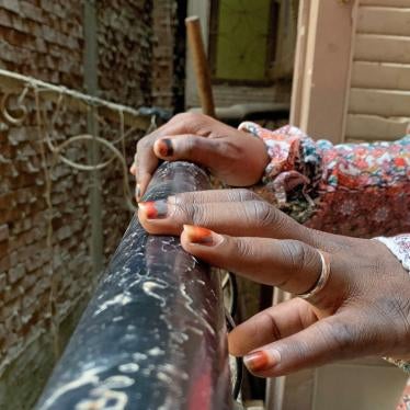 The hands of a refugee survivor of sexual assault, Cairo, Egypt.