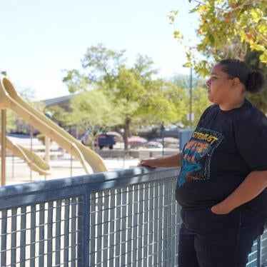 Mother looking at playground