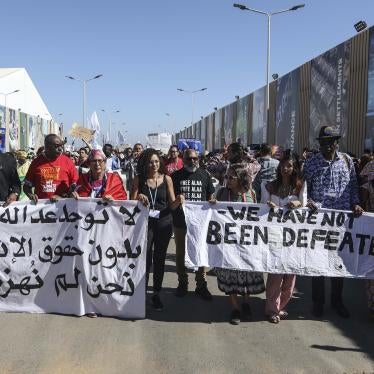 Sanaa Seif, sister of jailed Egyptian-British activist Alaa Abdel-Fattah, who went on a full hunger and water strike with the start of COP27 protesting his unjust imprisonment, takes part in the COP27 Coalition march during the 2022 United Nations Climate Change Conference COP27.