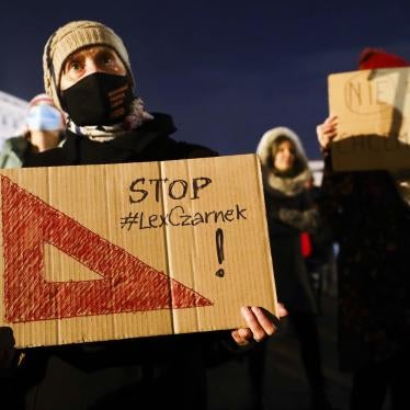 People attend 'Stop Lex Czarnek' protest at the Main Square in Krakow, Poland on February 15, 2022.