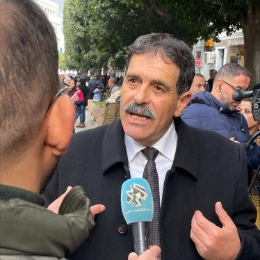 Lawyer Ayachi Hammami before his court hearing for speech offenses in Tunis.