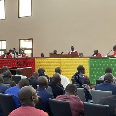 Defendants in Guinea’s 2009 stadium massacre trial appear before the judges on the first day of the trial, in Conakry, September 28, 2022. 