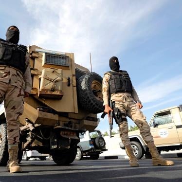 Army soldiers guard the entrance of tunnels
