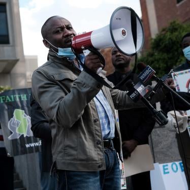 Haitian community leaders, immigrant community members, and their supporters gather on October 22, 2021 at the Newark Immigration and Customs Enforcement field office in Newark, New Jersey to demand that President Biden's administration stop deportations of Haitians. © Photo by Spencer Platt/Getty Images