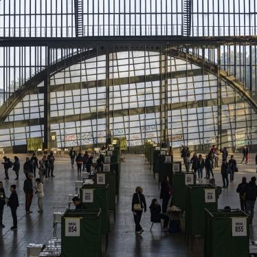 People vote at the former Mapocho train station, now a cultural center, during an election to choose members of a council to draft a proposed new constitution, Santiago, Chile, May 7, 2023. 