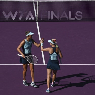 Storm Hunter of Australia and Elise Mertens of Belgium during a match during the GNP Seguros Women's Tennis Association Finals in Cancun, Mexico, October 30, 2023. 