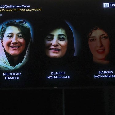 Three imprisoned Iranian female journalists, Niloofar Hamedi (L), Elaheh Mohammadi (C) and Narges Mohammadi during the award ceremony of the UNESCO/Guillermo Cano World Press Freedom Prize.