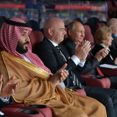 Saudi Crown Prince Mohammed bin Salman (L), FIFA President Gianni Infantino (C) and Russian President Vladimir Putin at 2018 World Cup in Moscow, June 14, 2018.