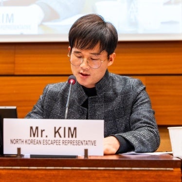 Kim Il Hyuk delivering a speech.