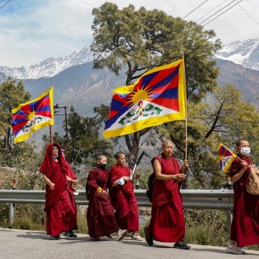 Tibetan monks in exile in India take part in a peace march commemorating the 1959 Tibetan uprising against Chinese rule, near Dharamsala, March 10, 2024.