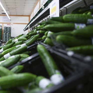 People choose groceries at a food bank in Stuttgart, Baden-Wurttemberg, Germany, July 21, 2022. 