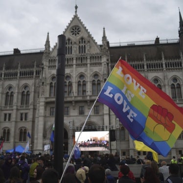 An LMBT+ flag at a rally in front of the Hungarian Parliament in Budapest, Hungary, on April 14. The protests erupt after the parliament passes legislation restricting the right to assembly, banning Pride Marches. 