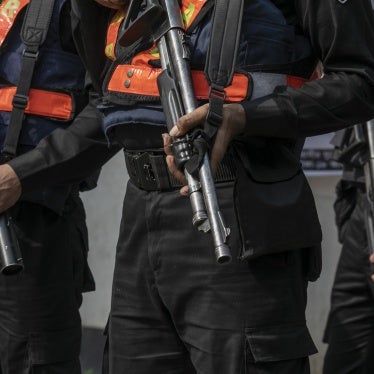 Members of Bangladesh’s paramilitary Rapid Action Battalion or RAB, a unit which is accused of enforced disappearances, stand guard in the capital Dhaka, January 7, 2024.