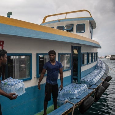 Bottled water is loaded onto a boat for delivery to another island in Malé, Maldives, December 18, 2019.