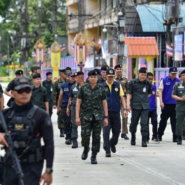 Thailand's commander of the 4th Army Region Lt. Gen. Paisan Nusang (C) and officials inspect the site of an insurgent attack outside the district office of Sungai Kolok in the southern Thailand province of Narathiwat on March 9, 2025. 