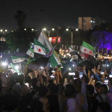 Syrians celebrate in Umayyad Square after U.S. President Donald Trump announced plans to ease sanctions on Syria in Damascus, Syria, Tuesday, May 13, 2025.