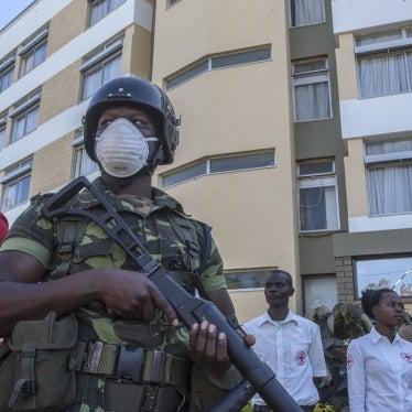 A policeman stands outside a hotel in Blantyre, Malawi, May 6, 2020.