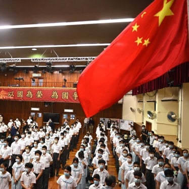 A flag raising ceremony on National Security Education Day at a secondary school in Hong Kong, China, April 15, 2021.