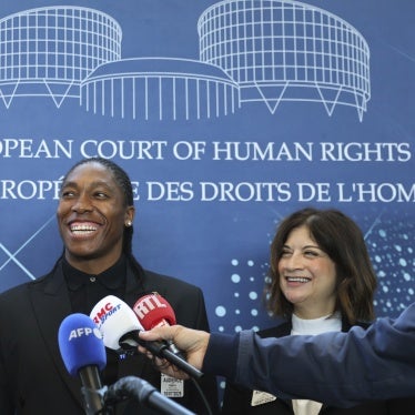 South Africa's Caster Semenya (C), answers reporters with lawyers Gregory Nott (L) , and Shona Jolly KC after Semenya won a partial victory at the European Court of Human Rights on in her seven-year legal fight against track and field's sex eligibility rules Strasbourg, eastern France, July 10, 2025.