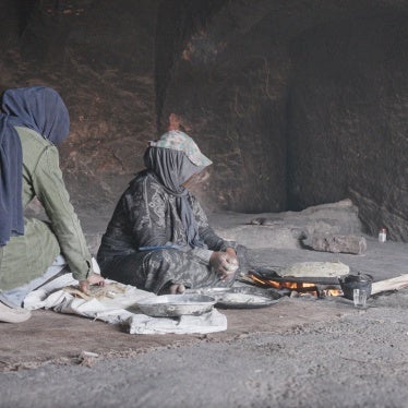 Bedul women making bread in one of the caves in Stooh al-Nabi Harun Mountain, Jordan.