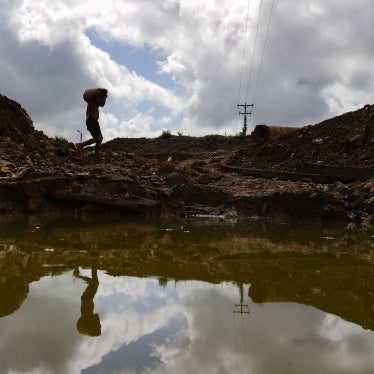 A gold miner carries a sack of rocks to a grinding mill at a mine in El Callao, Bolivar state, Venezuela, April 29, 2023. 