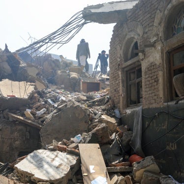 People inspect damage on September 13, 2025, in Sanaa, Yemen days after an Israeli strike hit the center of the city.
