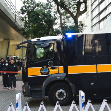 Prisoner transport vehicles outside the court in Hong Kong