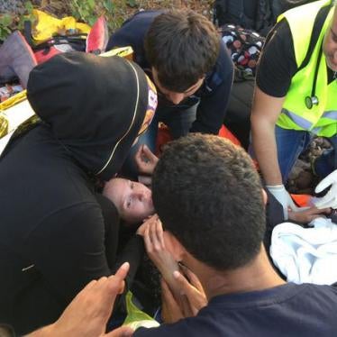 Syrian woman gave birth on beach after arriving in rubber boat on Lesbos this afternoon