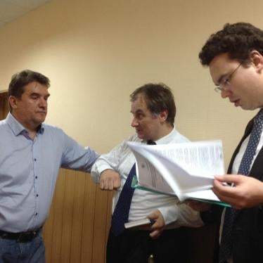 Representatives of Human Rights Center "Memorial" waiting for the court hearing to begin. September 28, 2015, Moscow.