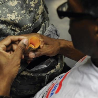 A US military veteran prepares to take his medication at Central Union Mission, in Washington, DC, which provides shelter for homeless men, on November 28, 2011.