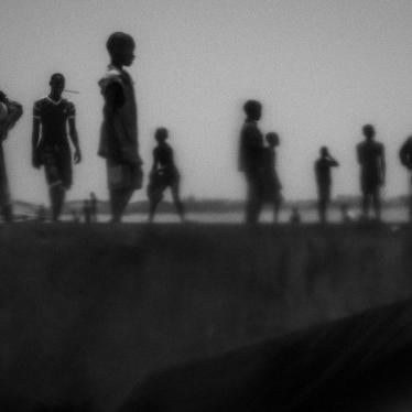 Talibés who have run away from their Quranic schools stand on the banks of the Senegal River, in northern Senegal. 
