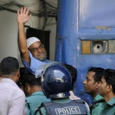 Mir Quasem Ali boards a prison van after International Crimes Tribunal sentenced him to death on November 2, 2014, for alleged 1971 war crimes. 