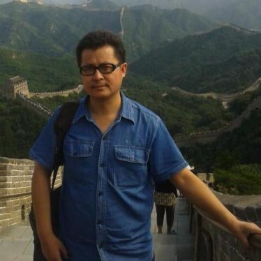 Guo Feixiong on the Great Wall of China, July 2012. 