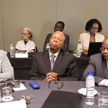 Jeremias Pondeca (center) was a member of a team preparing a meeting to end the current military and political hostilities between RENAMO and the government.
