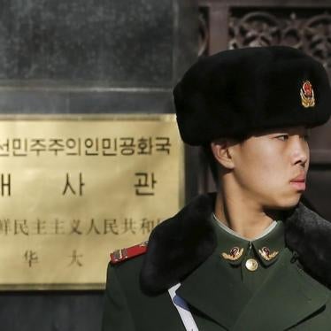 A paramilitary solider stands guard at the main gate of North Korea's embassy in Beijing January 6, 2016.