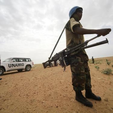 United Nations Mission in Darfur peacekeepers stand guard in Shagra village, North Darfur, October 18, 2012. © 2012 Reuters