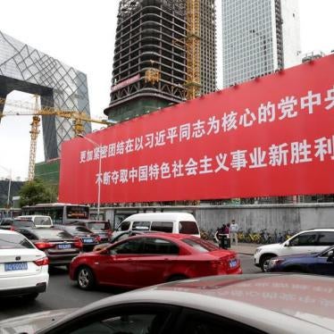 A giant banner is seen in Beijing's central business area, as the capital prepares for the 19th National Congress of the Communist Party of China, October 14, 2017. The words on the banner read, "Unite closely around the Party Central Committee with Comra