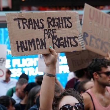People protest U.S. President Donald Trump's announcement that he plans to reinstate a ban on transgender individuals from serving in any capacity in the U.S. military, in Times Square, in New York City, New York, U.S., July 26, 2017.