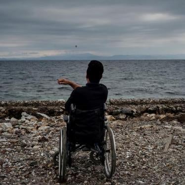 Greece refugee in wheel chair