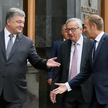 Ukrainian President Petro Poroshenko, European Commission President Jean-Claude Juncker and European Council President Donald Tusk arrive for a joint news conference following the EU-Ukraine summit in Kiev, Ukraine, July 13, 2017. 