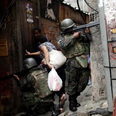 Members of the Armed Forces take up position during a operation after violent clashes between drug gangs in Rocinha slum in Rio de Janeiro, Brazil, September 22, 2017.