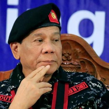 Philippine President Rodrigo Duterte, wearing a military uniform, gestures as he attends the 67th founding anniversary of the First Scout Ranger regiment in San Miguel town, Bulacan province, north of Manila, Philippines November 24, 2017.
