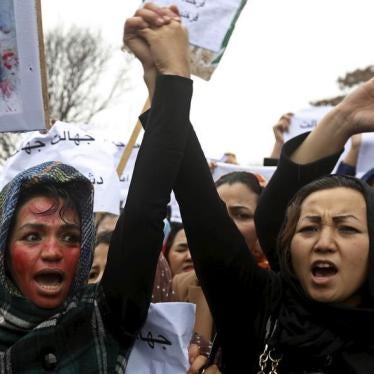 Members of civil society organizations chant slogans during a protest to condemn the killing of 27-year-old woman, Farkhunda, who was beaten with sticks and set on fire by a crowd of men in central Kabul in broad daylight on Thursday, in Kabul March 24, 2